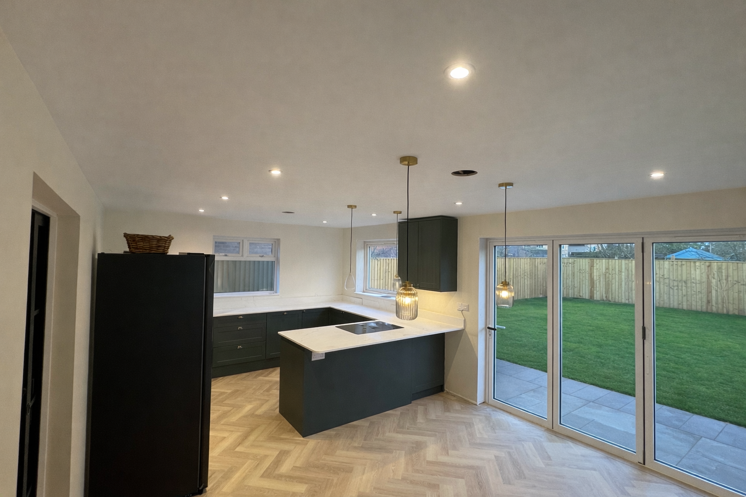 Open-plan kitchen extension with herringbone floor