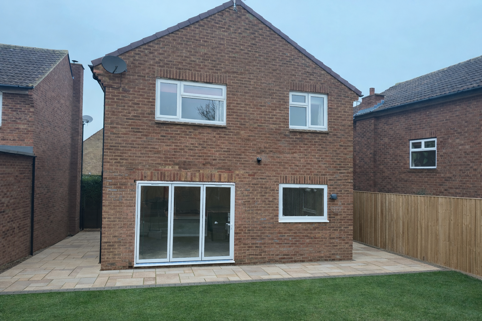 Rear extension with bi-fold doors and new patio
